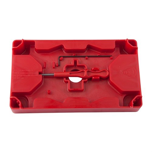 Le POLYMER ARMORER'S BLOCK & TOOLING PLATE facilite le travail sur les pistolets en polymère avec des bosses ajustables et des emplacements pour un démontage précis.
