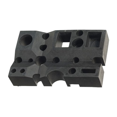 Le bloc de travail Archangel® est un outil polyvalent pour la réparation d'armes, avec des fentes pour le démontage des boulons et l'alignement des petites pièces.