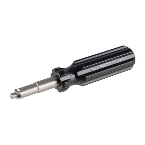 Le AR-15/M16 Carbon Scraper de MARK BROWN CUSTOM élimine facilement les dépôts de carbone sans abîmer le bolt carrier, assurant un fonctionnement optimal.