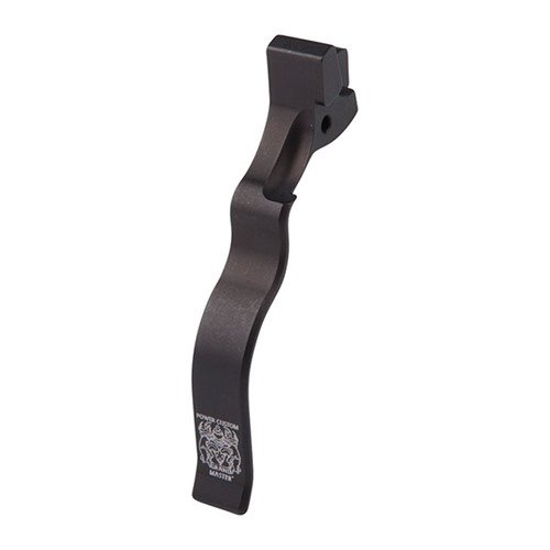Le Power Custom 10/22® Competition Extended Magazine Release en aluminium 6061 facilite les changements de chargeurs avec l'index, idéal pour la compétition.