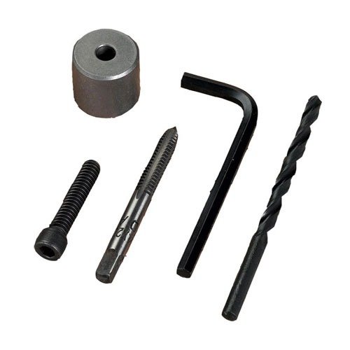 Le kit STUCK CASE REMOVER de RCBS te permet de retirer facilement les douilles coincées grâce à un foret, un taraud, une clé et un bloc d'espacement.